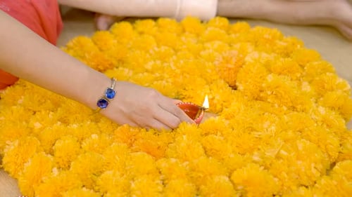 Bright Flowers and Lit Diya Celebration