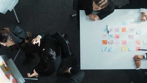 Overhead View of Corporate Team Brainstorming and Collaborating