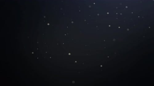 Aufnahme von Staubpartikeln, die in der Luft schweben. Kugeln auf schwarzem Hintergrund. Verschwommener Effekt der Linse.