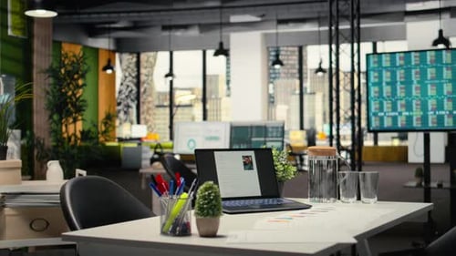 Empty Office with a Laptop Showcasing CV Candidate Before Job Interview