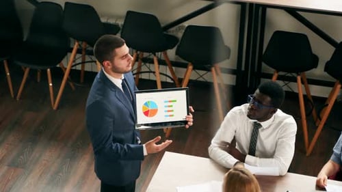 Business Presentation with Data Charts in Modern Office