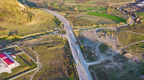 Aerial vehicles on a double lane highway 4K
