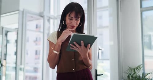 Thinking, creative and woman on tablet for story, article review and feedback in office