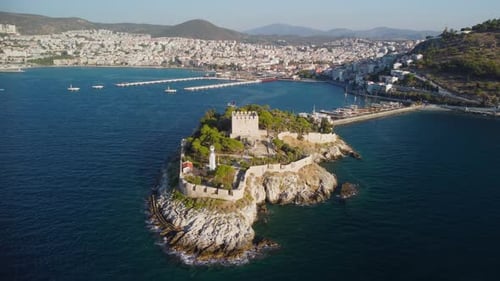 Awesome aerial view of Guvercinada with scenic castle, Kusadasi