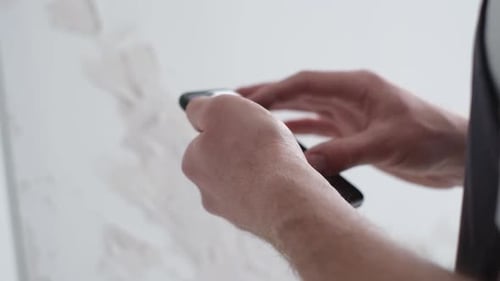 A Creative Artist Paints a Creative Picture on a Canvas The Process of Painting in the Workshop