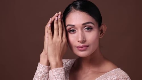 Glamorous Woman Posing with Elegance and Style