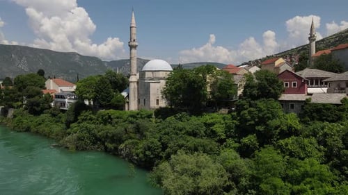 Important mosques of the city of Mostar in Bosnia, aerial drone view ottoman architecture of Mostar