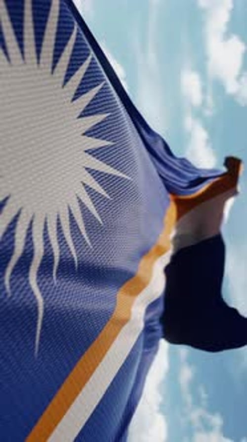 Marshall Islands Flag Waving in Blue Sky