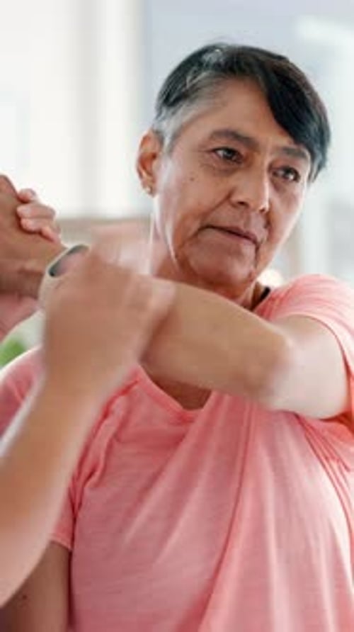Physical therapy, arm pain and physiotherapist with woman at clinic for injury recovery