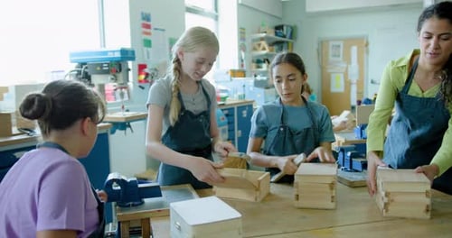 Students Building Wooden Boxes in a Classroom