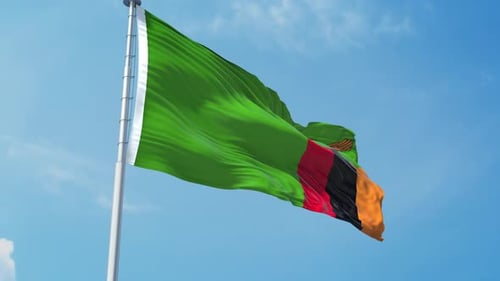 Realistic Waving Flag of Zambia Against Blue Sky
