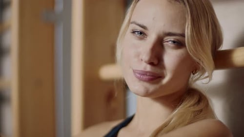 Happy Lady Relaxing After Fitness Training in Sport Club. Portrait of Satisfied