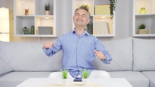Happy dancing man full of joy.