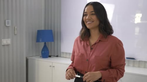 Young Manager Woman Leading a Business Meeting in the Office