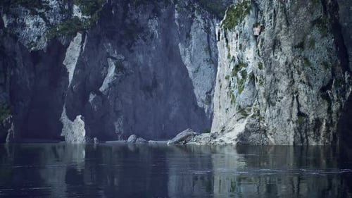 Blue Ocean and Rocky Cliffs