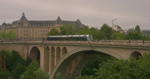 Scenic View of Adolphe Bridge Stone Arched Aqueduct Running Over Green Valley of Petrusse River in