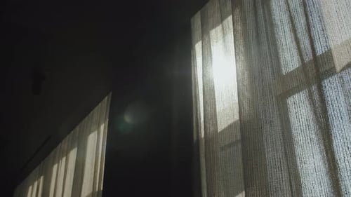 Sunlight Through Curtains Creates Abstract Light Display