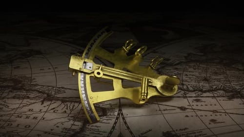 An Antique Nautical Sextant On An Old World Map