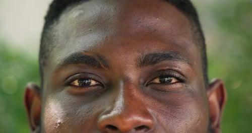 Close-up of mature man's eyes outdoors, reflecting calm and thoughtful expression