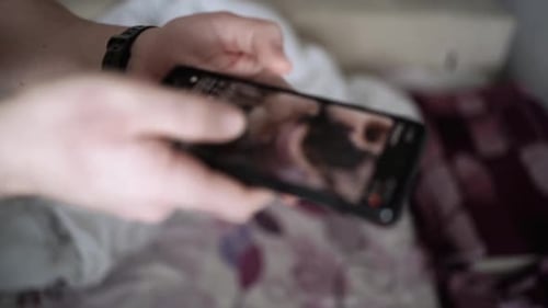 Man scrolling social media in smartphone