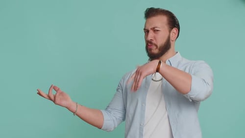 Lebanese Man Showing Thumbs Up Pointing Empty Place Advertising Area for Commercial Text Copy Space