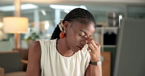 Woman, headache or burnout in office with computer for digital marketing crisis