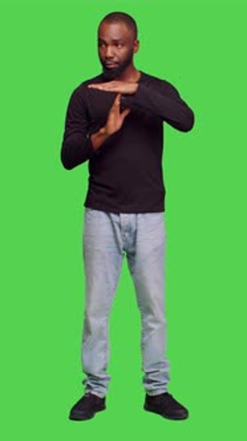 Vertical Video Front View of Young Model Showing Timeout Symbol in Studio