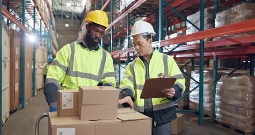 Logistics, discussion and men in storage warehouse, collaboration or instructions to complete task