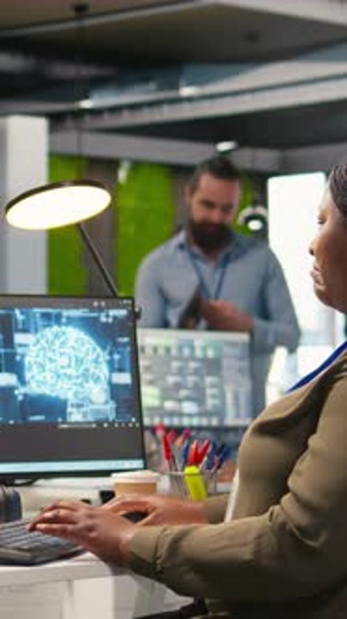 Vertical Video Female Technician Using Computer to Write Code Developing Machine Learning API