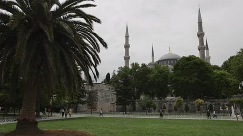 Blue Mosque with surrounding greenery and visitors, Istanbul, Turkey