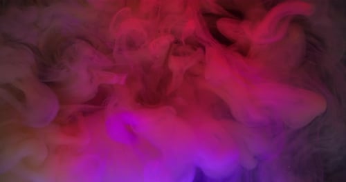 Colorful swirling clouds of red, yellow, and purple