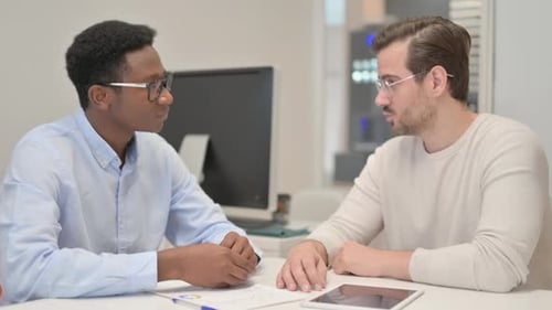 Business People Shaking Hand in Office