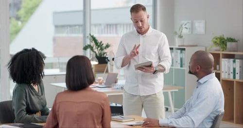 Businessman, speaker and team with tablet for meeting, presentation or training in office