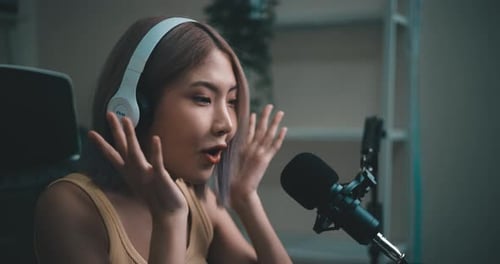 Woman Recording a Podcast at Home