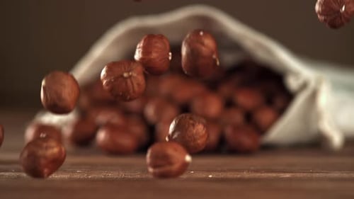 Hazelnuts Falling in Slow Motion in Home Setting