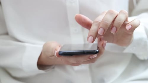 Woman's Hands Using Modern Mobile Smartphone Device
