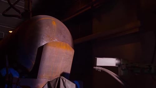 A Stunning Futuristic Metallic Sculpture Captured in Dramatic and Artistic Lighting Effects