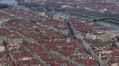 Aerial View Capturing Lyon's Cityscape with Saone River Meandering Between Urban Structures and