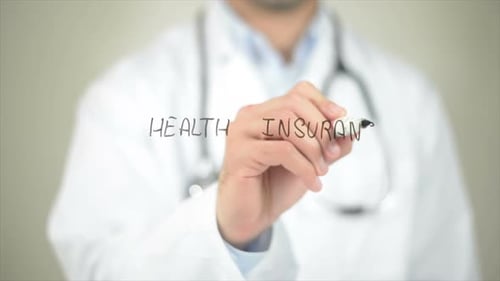 Doctor Writing Health Insurance on Glass Surface