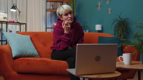 Young Woman at Home Wearing Headset Freelance Worker Call Center Support Service Operator Helpline