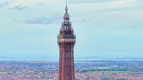 Drone footage of the famous Blackpool Tower with blue sky on a beautiful summer day in one of the UK