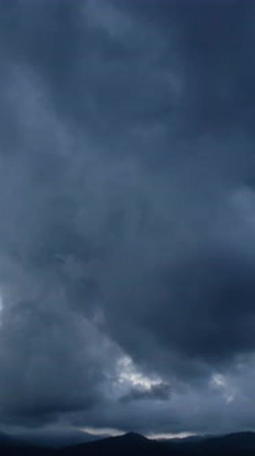 Dark Clouds Over Mountain Range