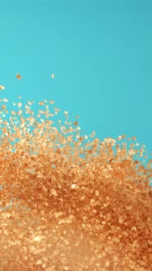 Cane Sugar Soars Against a Blue Background Filmed on a Highspeed Camera at 1000 Fps