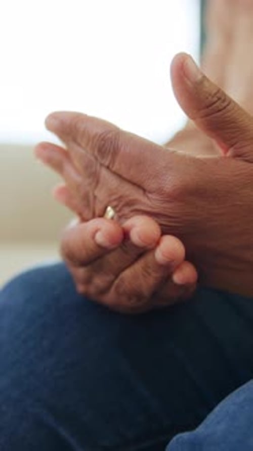 Close Up of Wrinkled Hands Clapping Together
