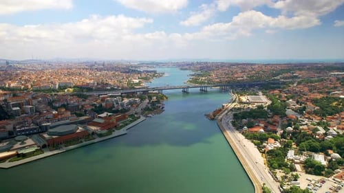 Aerial drone view of Istanbul, Turkey. Halic Bridge, multiple residential buildings on the both side