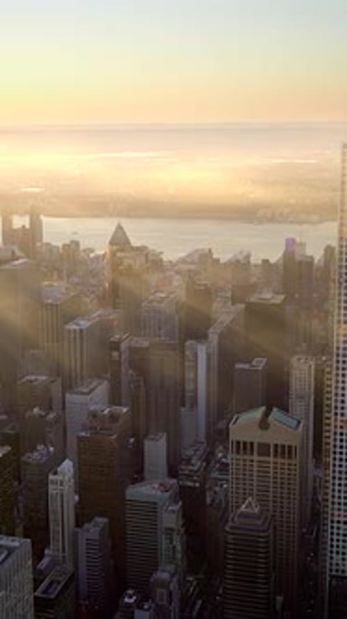 Stunning and Breathtaking Aerial View of a Modern Cityscape at Gorgeous Sunset Time