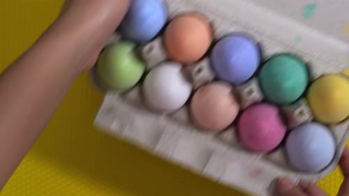 Painted Easter Eggs in a Carton Close Up