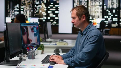 Skilled Photo Editor Working on Creative Editing and Generating Content