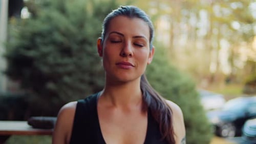 Close Up of Young Woman in Suburban Setting