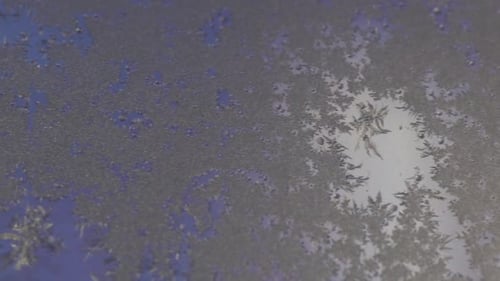Frost covering a window. Macro, slide from right to left.
